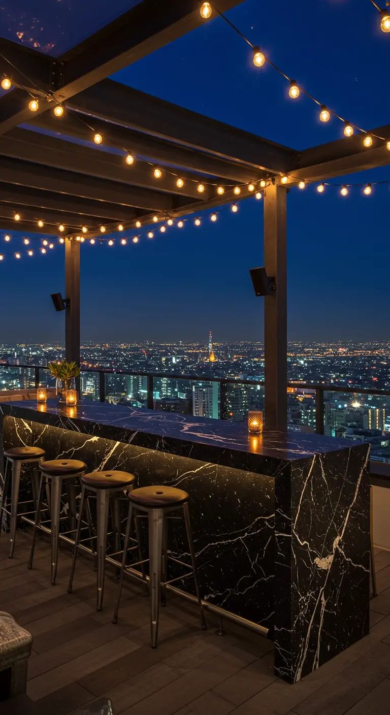 Rooftop bar with a black marble counter illuminated by a hidden LED strip.