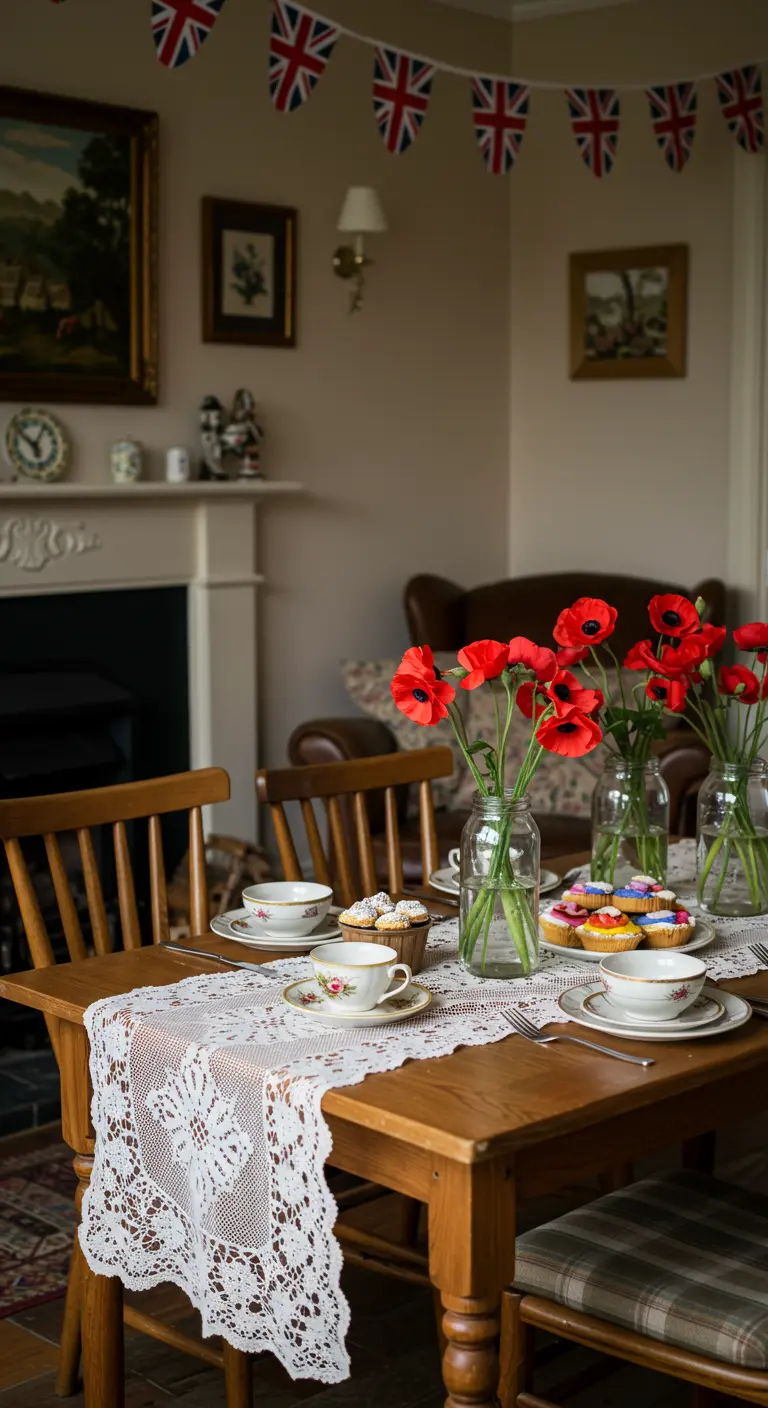 A cozy, British-themed tea party table with a lace runner, poppies, and a Union Jack bunting.