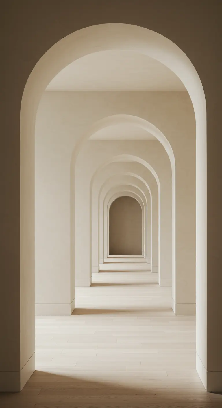 A long, bright hallway with a repeating series of clean, modern archways creating depth.