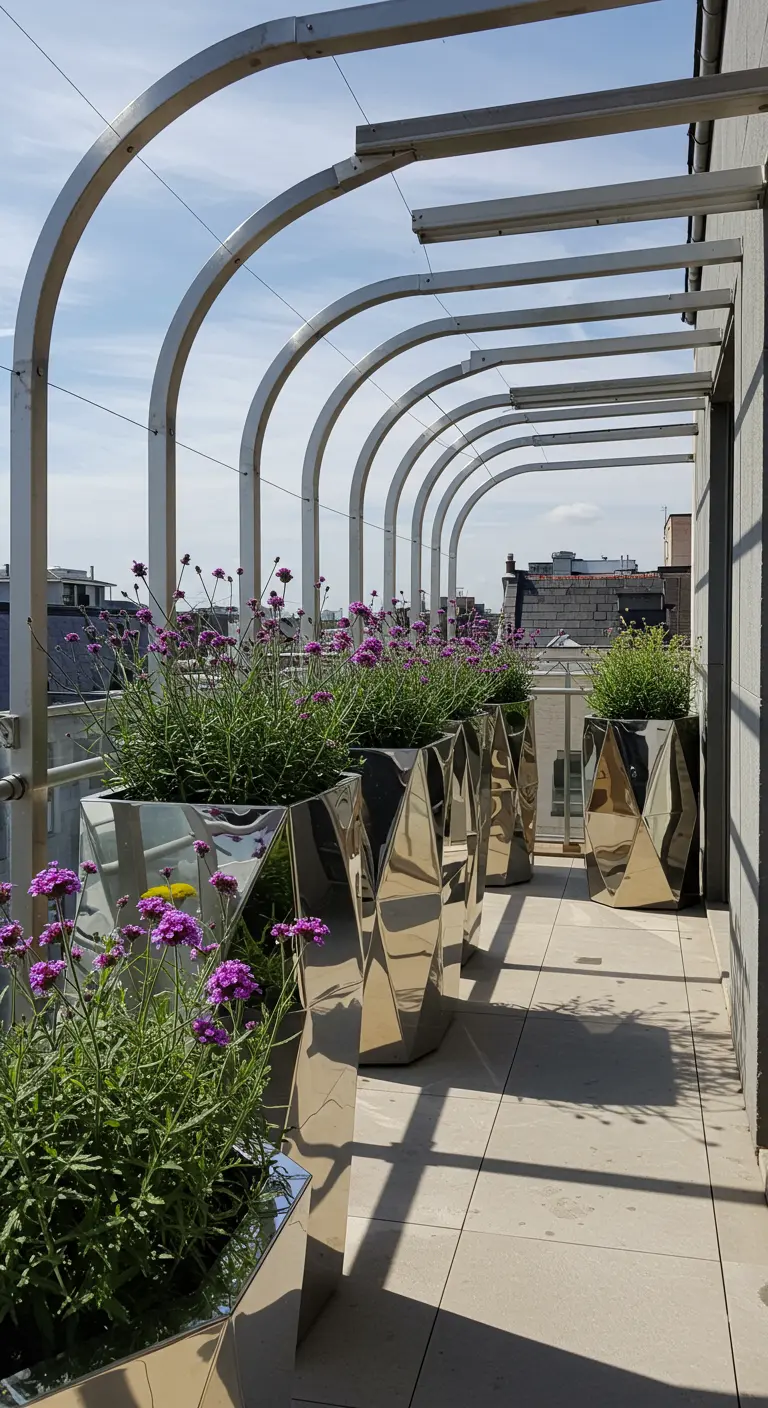 A modern balcony with a series of arched metal ribs and faceted mirrored planters.