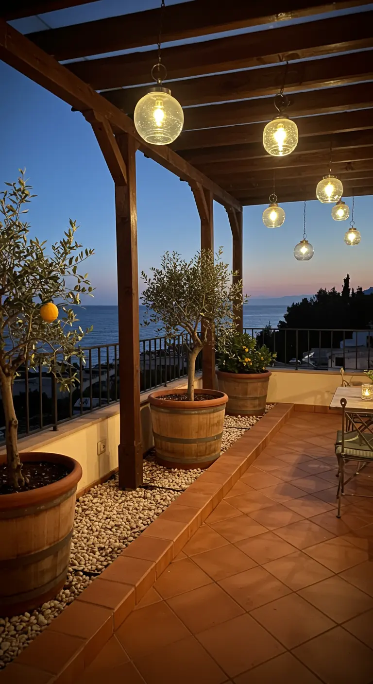 A terrace with a wooden pergola and hanging globe lights over potted trees.